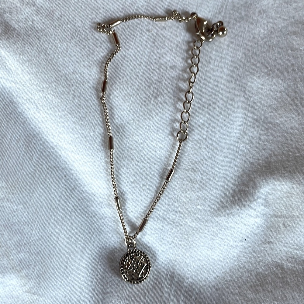 Costume jewelry gold  bracelet With small gold medallion size adjustable